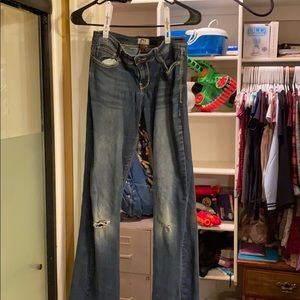 ripped boot cut jeans